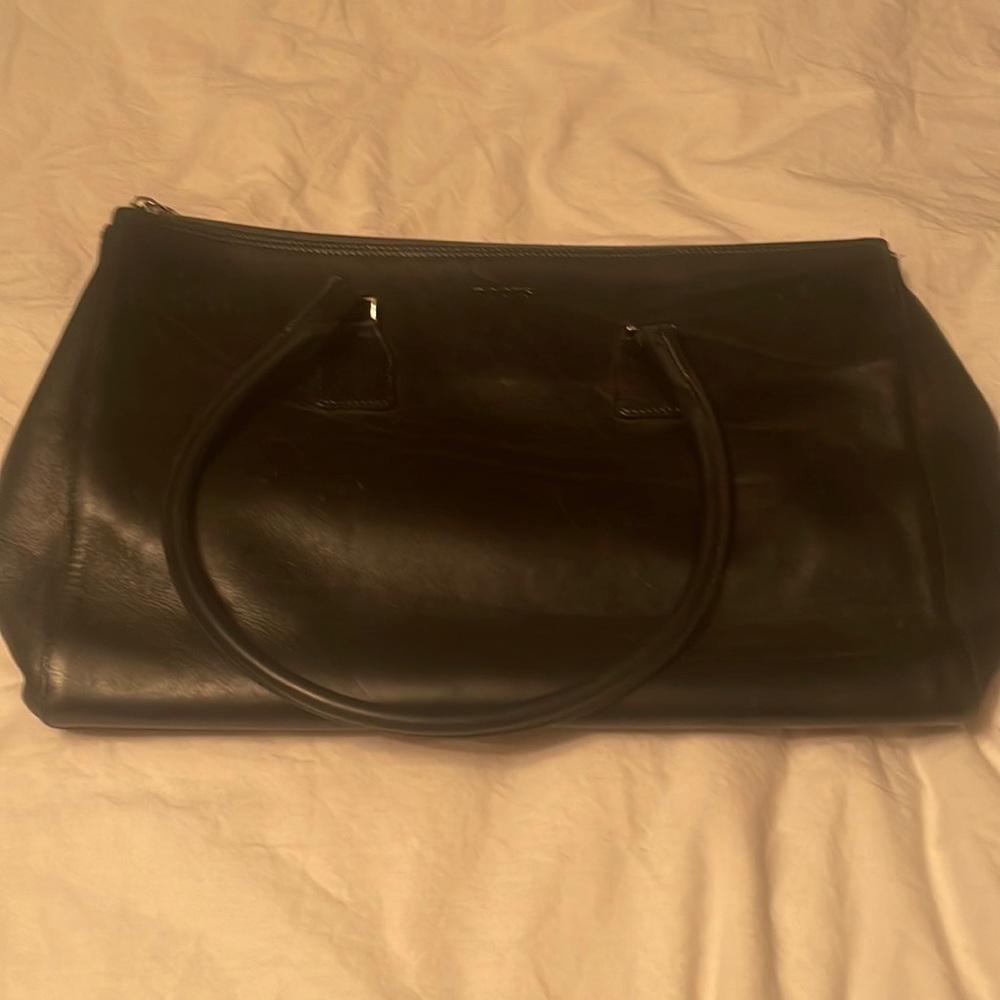 Very dark brown Roots leather bag